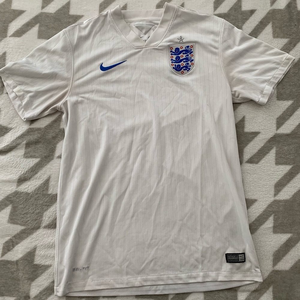 white Nike (DriFit) Jersey for the team England.